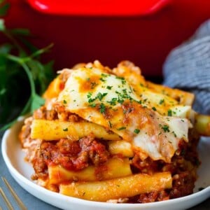 A serving of baked ziti with meat sauce and ricotta cheese.