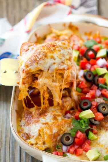This easy recipe for chicken enchilada casserole is just 5 ingredients, all layered together and baked to perfection. A quick and simple meal that the whole family will love!