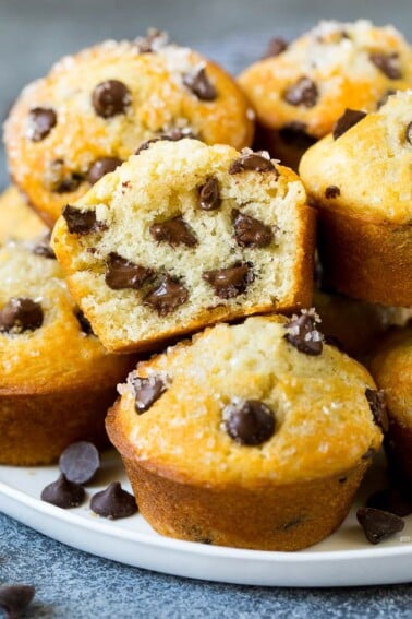 A cross section of a cut chocolate chip muffin.