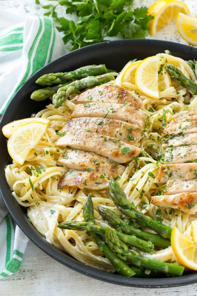 This recipe for lemon asparagus pasta combines tender asparagus and grilled chicken with pasta in a lemon cream sauce. It's a delicious and hearty entree that everyone will want seconds of!