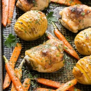 This maple dijon chicken with hasselback potatoes and carrots is a healthy and easy one pan meal that the whole family will love!