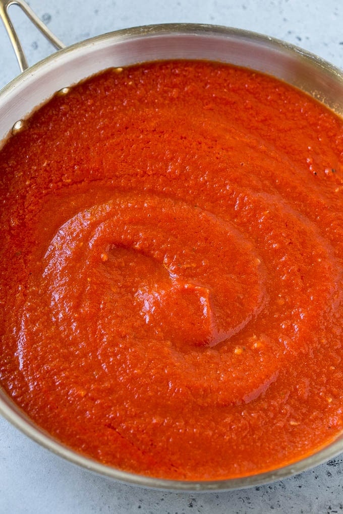 Tomato puree, butter and garlic in a skillet.