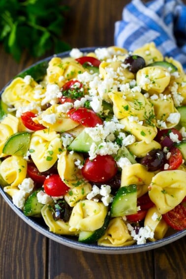 Tortellini salad with cucumber, tomato, olives and feta cheese.